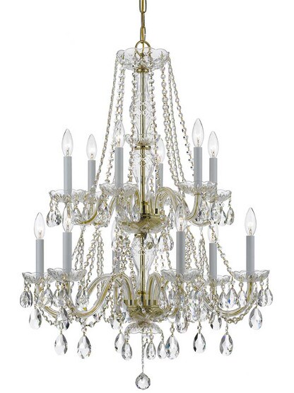 Traditional Crystal 12 Light Chandelier in Polished Brass.